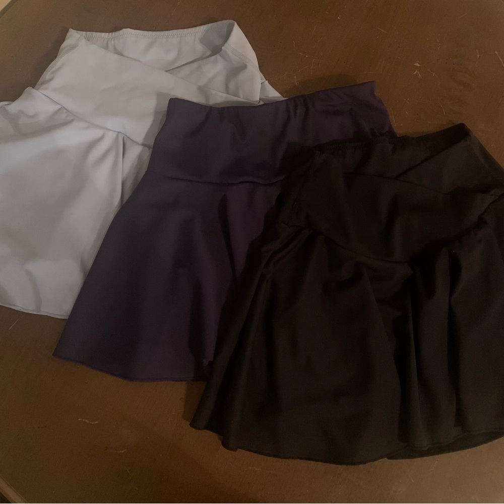 Halara skirts. XXS. Blue and navy are brand new, black like new. Shorts inside.